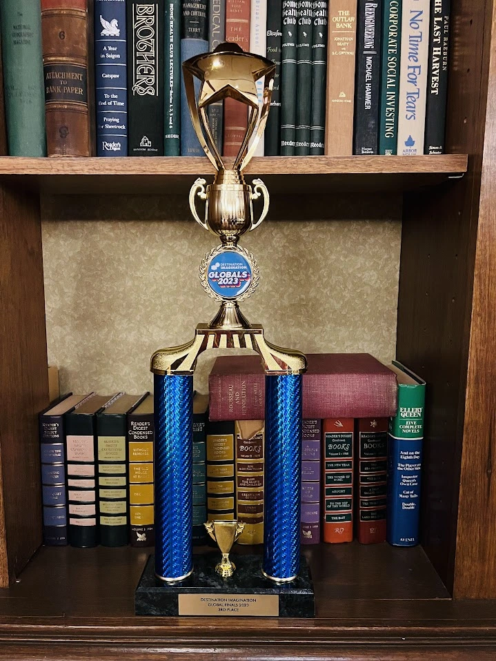 A photo of our Kansas City Global Finals Third Place 2022-2023 trophy taken in our secret lounge.